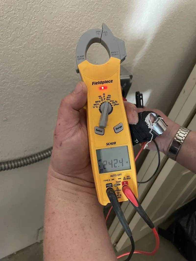 Voltage testing with clamp meter during Generator Installation in Upper Deerfield